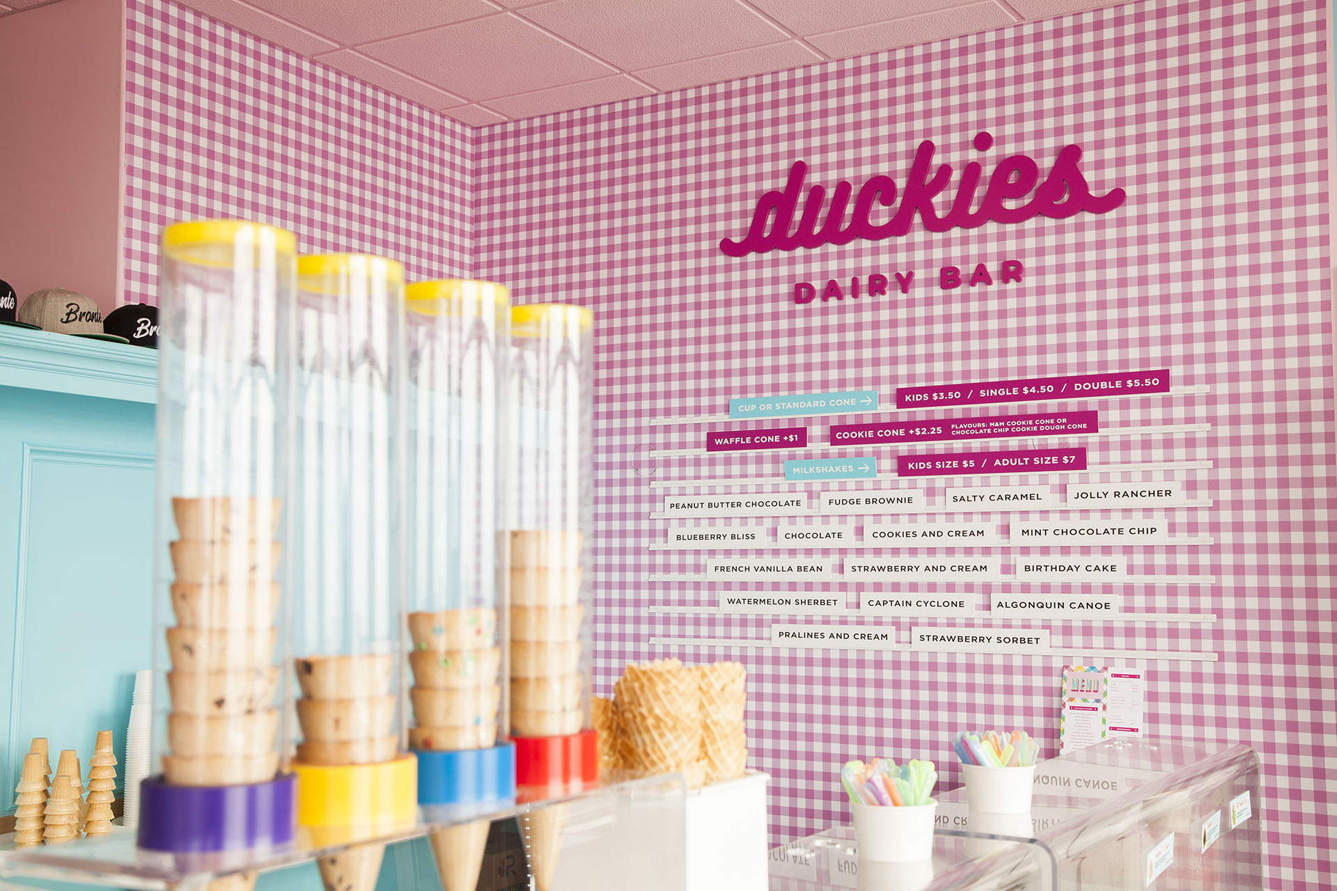 Interior of Duckies Dairy Bar with ice cream cone dispensers on top of the counter